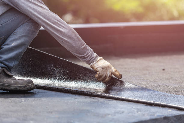 Professional Basement Waterproofing technician working in Mechanicsburg, PA